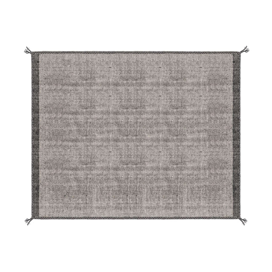 Szürke gyapjú szőnyeg.