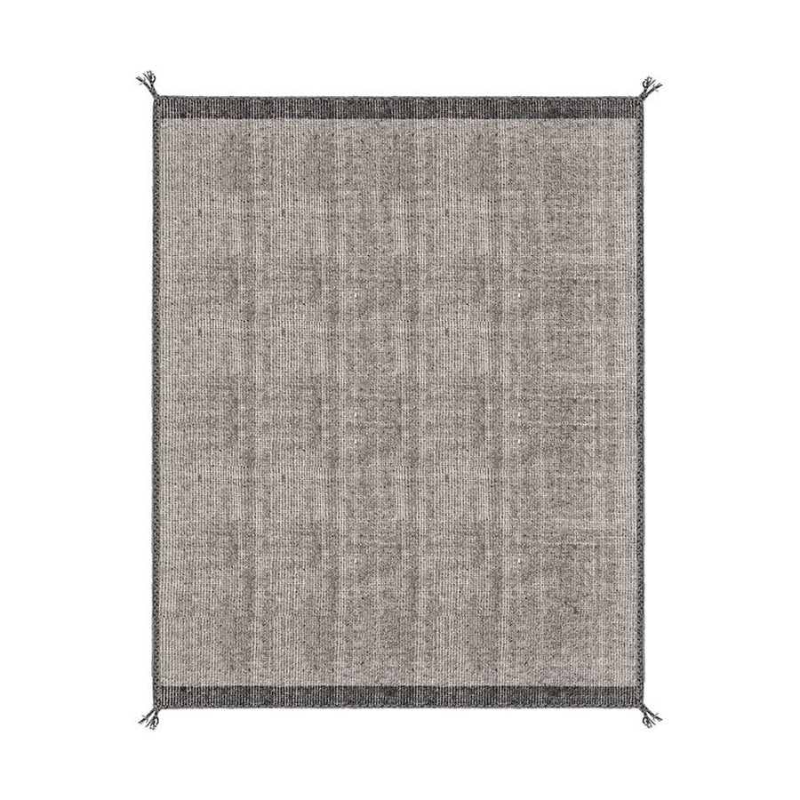 Szürke gyapjú szőnyeg.