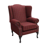 Chesterfield stílusú, magas háttámlájú, szárnyas fotel keményfa lábbakkal, balmoral kockás mintájú exkluzív minőségű gyapjúszövettel kárpitozva.