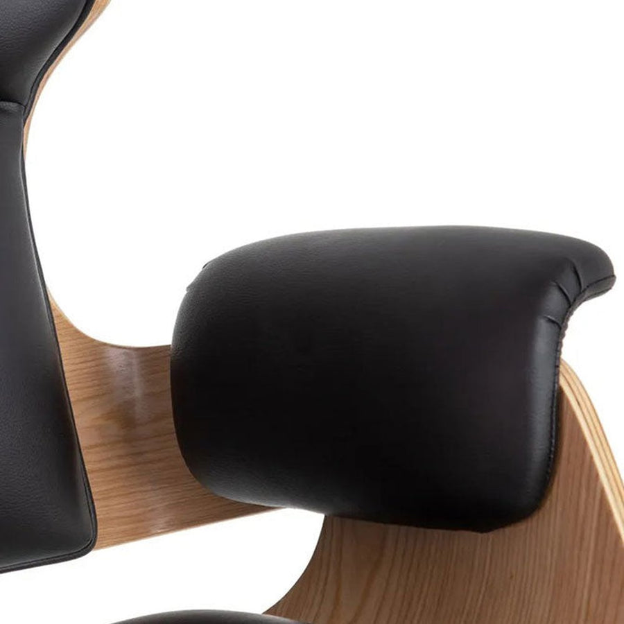 Prémium kategóriás, modern illetve loft stílusú, állítható magasságú, dió furnéros, fekete műbőr kárpitú, kerekes irodai vezetői forgószék