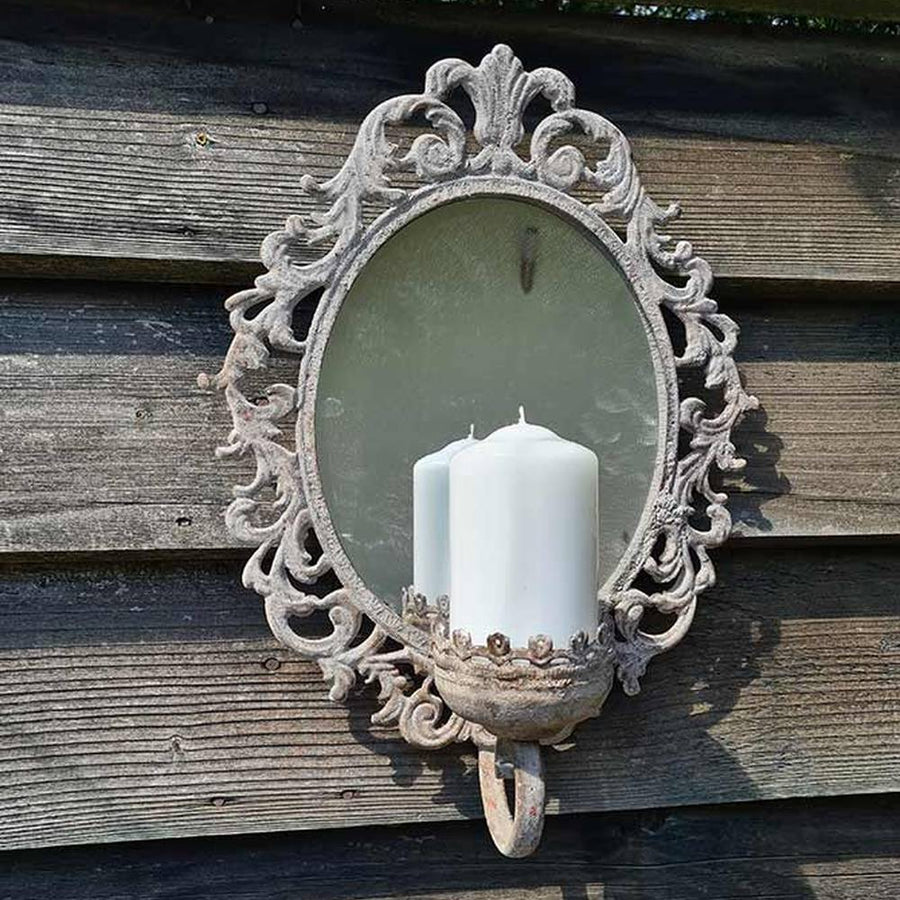 Vintage stílusú, antikolt fém falitükör gyertyatartóval