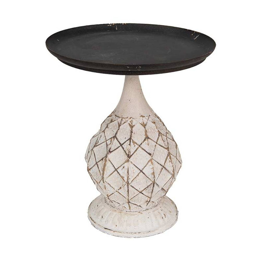 Antikolt felületű, fémből készült, fekete és krém színű lerakó kisasztal.