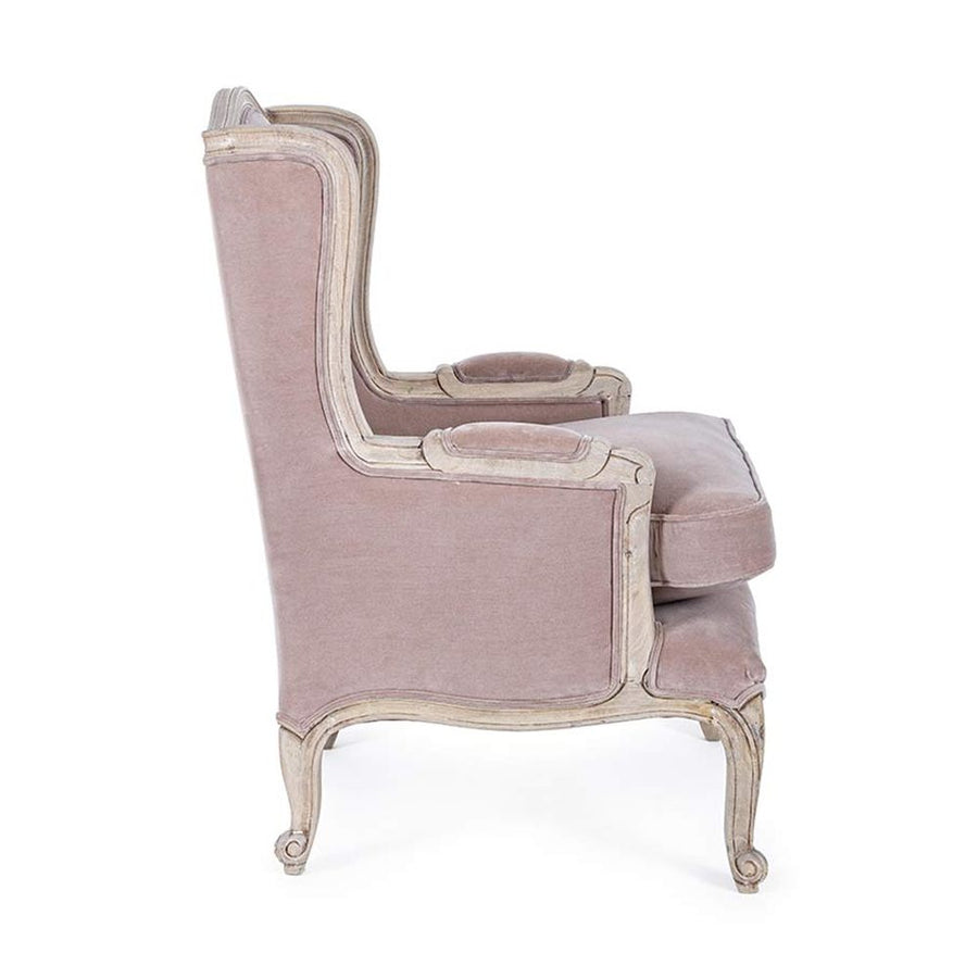 Koloniál stílusú, újrahasznosított mangófából készült púderrózsaszín fülesfotel.