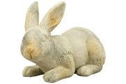 Rusztikus vidéki stílusú, 22 cm hosszú és 15 cm magas, antikolt felületű, krém színű húsvéti nyuszi figura.