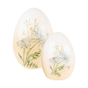 Mezei virágokkal díszíttetett húsvéti kerámia tojás.