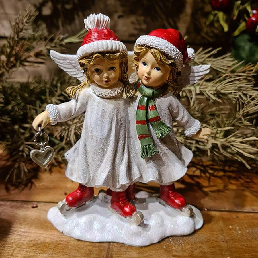 Korcsolyázó karácsonyi angyalok.