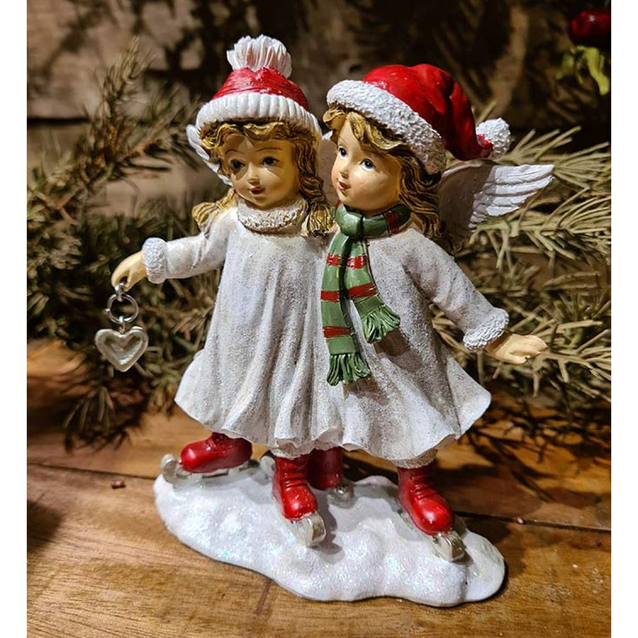 Korcsolyázó karácsonyi angyalok.