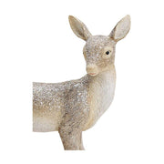 Pöttyös hátú, deres felületű, szürke színű karácsonyi őzike figura.