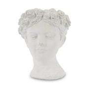 Antikolt felületű, krém színű kaspó büszt.