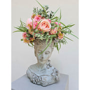 Női mellszobor formájú,, antikolt felületű cementből készült kaspó büszt.