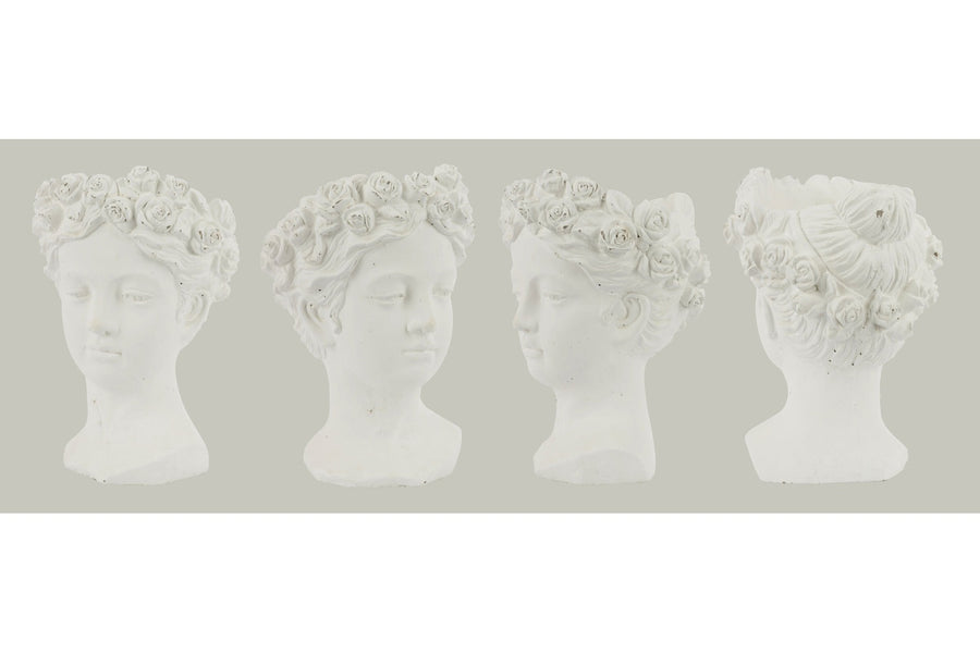 Antikolt felületű, krém színű kaspó büszt.