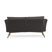 Fromatervezett kerti kanapé sötétszürke ülő- és hátpárnákkal.