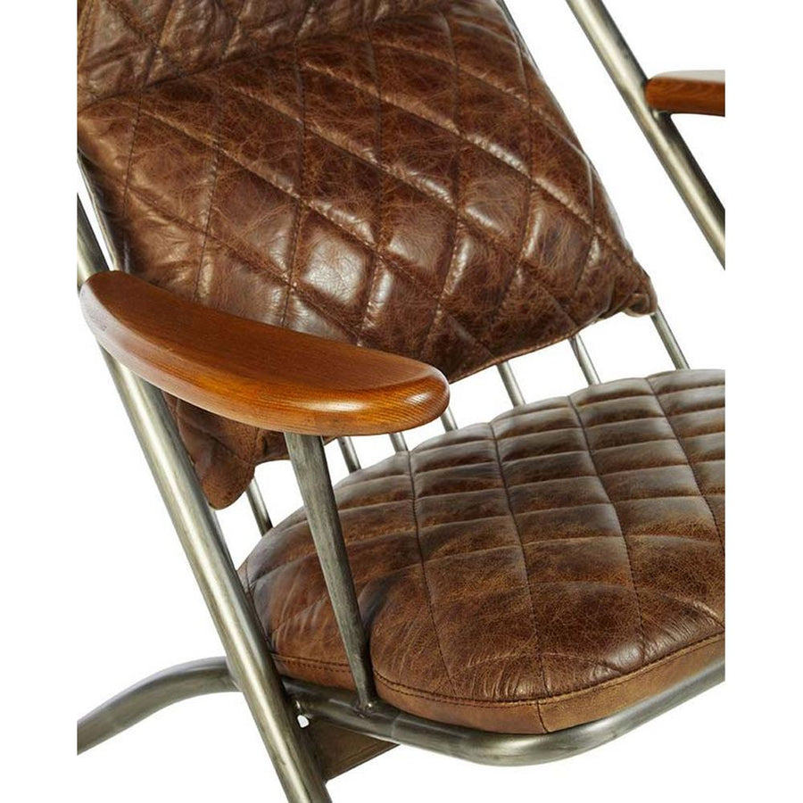 Vasból készült, vintage sötétbarna színű marhabőrrel kárpitozott, kortárs-loft stílusú, formatervezett prémium pihenő karosszék