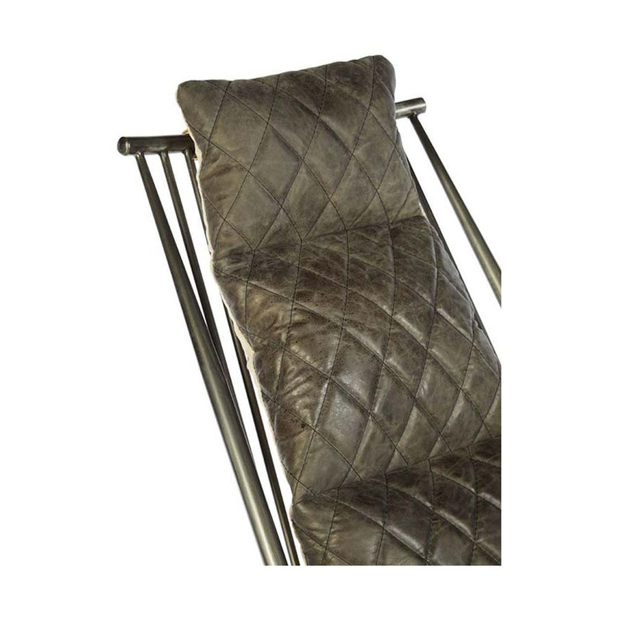 Vasból készült, vintage ébenfa színű marhabőrrel kárpitozott, kortárs-loft stílusú, formatervezett prémium pihenő karosszék.