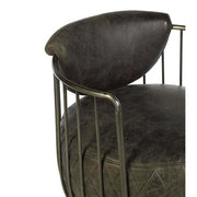 Vasból készült, 360 fokban körbe forgatható, ébenfa színű marhabőrrel kárpitozott, kortárs-loft stílusú, formatervezett prémium klubfotel.