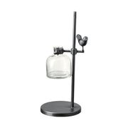 Loft stílusú,, madárral díszített, fém lombikállványba helyezett üveg váza.