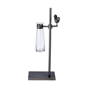 Loft stílusú,, madárkával díszített, fém lombikállványba helyezett üveg váza.