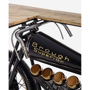 Vintage versenymotor formájú, fekete színű kézműves fém bortartó bárpult fa fedlappal.