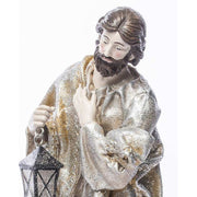 Karácsonyi betlehem József figurája lámpással a kezében