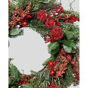 Mesterséges mű nobilis fenyőágakból, bukszuslevelekből és bogyókból készült karácsonyi koszorú ajtódísz.