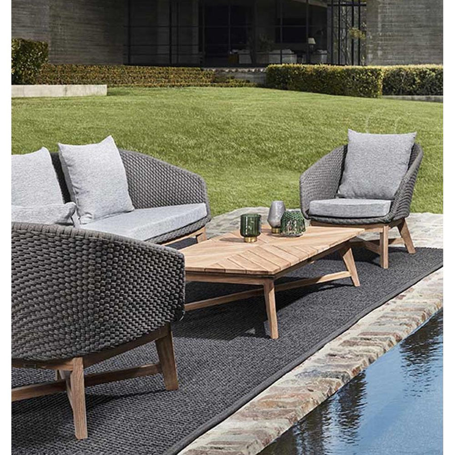 Prémium kategóriás, 2 személyes design kerti kanapé szürke színű párnákkal