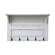 Antikolt felületű krém színű fali fogas konzolos polc kialakítással.